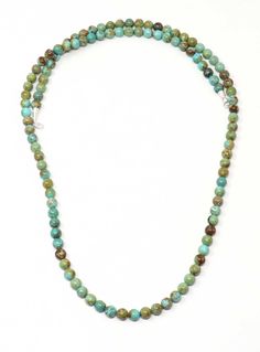 "35"" turquoise necklace featuring 8mm round beads finished with silver cones and closure." Luxury Southwestern Hand-strung Beaded Necklaces, Luxury Southwestern Single Strand Beaded Necklace, Cheap Hand-strung Southwestern Beaded Necklaces, Luxury Southwestern Single Strand Beaded Necklaces, Round Bead Necklace, Bead Necklace, Round Beads, Turquoise Necklace, Beaded Necklace