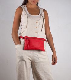 women Leather Fanny pack, leather belt bag, Hip Pouch, red belt bag, women belt bag, waist bag, small fanny pack, women waist bag, nubuckcuir Waist bag - shoulder bag made from 100% high-quality leather . It highlights its versatility with the original and avant-garde design, comfortable and convenient to carry everything you need. Made by Nubuckcuir through a process guaranteeing 100 % handmade high quality. Limited edition . Details: * High quality cowhide European origin. Soft and very resist Red Pouch Belt Bag For Travel, Red Travel Pouch Belt Bag, Adjustable Pouch Belt Bag, Casual Pouch Belt Bag With Belt Loops, Casual Belt Bag With Pouch Shape, Red Belt Bag With Removable Pouch, Red Pouch Belt Bag For Daily Use, Red Crossbody Belt Bag With Removable Pouch, Red Casual Belt Bag With Adjustable Strap