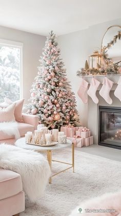 a living room decorated for christmas with pink and white decor