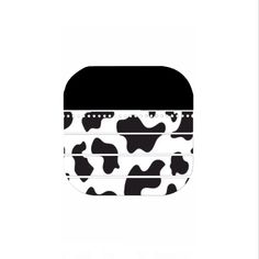 an animal print wallet with black and white spots