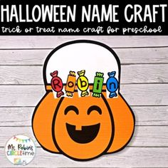 a pumpkin with the word halloween name craft on it's face and some candy