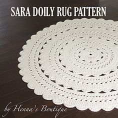 a white crocheted doily with the words sara dolly rug pattern on it