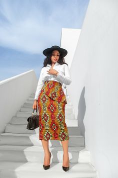 High waist front panel pencil skirt. Tribal African print cotton fabric. Unlined. Skirt length measures approximately 28in. Back zipper. Skirt has an elastic at the back waist. Model is 5'6 and wearing a size M. Ankara Skirt Ideas, Ghana Outfits, African Pencil Skirt, African Print Pencil Skirt, Long Tight Skirt, African Skirt Outfit, African Suits, Style Ankara, Ankara Skirt Styles