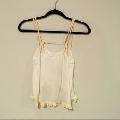 White And Cream Freepeople Intimates Tank Top. Geometric Design In The Front Of The Top. Brand New Never Been Worn! White Cotton Tank Top For Daytime, Cream Sleeveless Daytime Top, Cream Sleeveless Top For Daytime, Off White Sleeveless Cotton Tops, Summer Cotton Tops For Daytime, Casual Cream Cami Top, Cream Cotton Beach Tops, Cream Cotton Top For The Beach, White Cotton Tops For Daytime