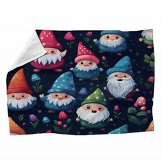 a blanket with gnomes and mushrooms on it