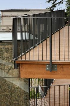 a skateboarder is doing a trick on the rail