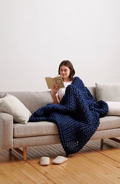 A chunky, weighted knit helps you sleep better and feel calmer under a blanket made with a touch of stretch from soft organic cotton. 40" x 72" (15 lbs.); 45" x 72" (20 lbs.); 48" x 72" (25 lbs.) 10% of your body weight recommended for optimal comfort for single-sized blankets 95% organic cotton, 5% spandex Machine wash, tumble dry Imported This product meets Nordstrom Sustainably Sourced Materials criteria: contains at least 50% sustainably sourced materials Thermal Blanket, Heavy Blanket, Chunky Knitting, Natural Weave, Organic Cotton Yarn, Knit Blanket, Improve Sleep Quality, Weighted Blanket, Sleep Better