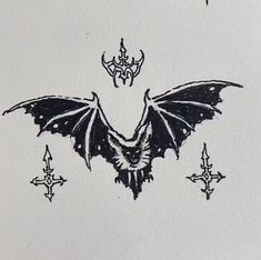 a drawing of a bat with crosses on it's back and wings spread out