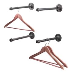 three wooden clothes hangers with metal bar ends