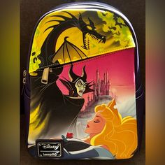 this is an image of a back pack with the characters from disney's beauty and the beast on it