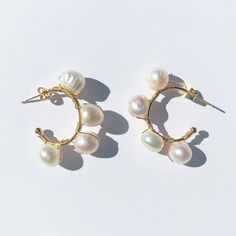 These stunning stylish 14k gold plated over brass earrings give a piece of bold and classic statement jewelry that elevates our look for every day. The elegant gold and natural freshwater earrings suit various occasions and make a perfect affordable Christmas gift. The irregular shape pearl earrings are hand wire wrapped with thin brass wire that is hypoallergenic for sensitive ears and made with genuine round and oval white freshwater cultured rice pearls. MATERIAL: Hoops 14k Gold plated over B Affordable Christmas Gifts, Rice Pearls, Pear Earrings, Florida Usa, Brass Earrings, Gold Hoops, Pearl Size, Sensitive Ears, Statement Jewelry