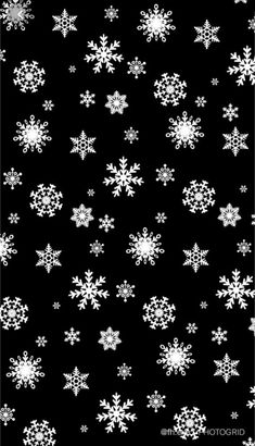 white snowflakes on a black background are very festive for the holiday season