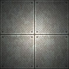 four square metal grates on a black background