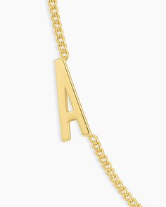 This classic plated gold initial bracelet features a personal initial design. This initial bracelet is perfect for stacking with other gold bracelets, and its lightweight construction makes it comfortable to wear. Wilder Alphabet Bracelet in Gold/A, Women's by gorjana Classic Bracelets With Initials, Minimalist Monogram Name Bracelet In Yellow Gold, Minimalist Monogrammed Name Bracelet In Yellow Gold, Minimalist Yellow Gold Monogram Name Bracelet, Gold Initials Name Bracelet For Everyday, Everyday Gold Name Bracelet With Initials, Classic Monogram Name Bracelet In Yellow Gold, Classic Yellow Gold Monogram Name Bracelet, Classic Monogram Yellow Gold Name Bracelet