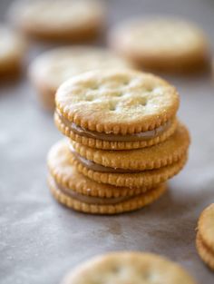 several crackers stacked on top of each other in front of the camera, ready to be eaten