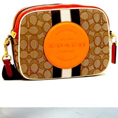 This Is An Authentic Coach Bag. I Posted A Picture Of The Tag Of Authenticity :) It Was A Gift Used 3 Times And Got Compliments. In Great Condition. Coach Orange Bag With Detachable Strap, Coach Orange Crossbody Shoulder Bag, Coach Orange Shoulder Bag, Coach Orange Rectangular Shoulder Bag, Coach Orange Rectangular Bag, Coach Orange Leather Bag, Coach Orange Satchel Bag, Travel Shoulder Bag With Branded Hardware In Orange, Orange Rectangular Bag With Branded Hardware