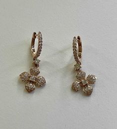 A pair of 0.92 carat lab grown diamond clover earrings set in 18K rose gold. Available in 18K rose gold, white gold and yellow gold. Lab Grown Diamonds: Our lab grown diamonds are CVD diamonds and are not HPHT, synthetic, or treated. These are 100% diamonds just like a natural diamond. Only difference is that it was grown in a lab instead of the ground! Item Details • Made to Order.• Gold Kt: 18K Solid Gold• Custom Gold Color: Rose Gold, Yellow Gold, White Gold• Diamond Cut: Round• Setting Type: Prong• Ready to Ship in 15-20 business days• Lab Grown Diamonds: 120 diamonds in total, Color is DEF, Cutting is brilliant cut and Quality is VVS-VS If you have any additional questions about this ring, just hit the "Ask a Question" button (just to the right of the price) and we will get back you w Cvd Diamond, Clover Earrings, Rose Gold White, Brooch Jewelry, Rose Gold Diamonds, Earrings Set, 18k Rose Gold, White Gold Diamonds, Lab Grown