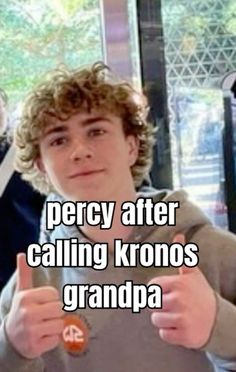 a young man holding a candy bar in his right hand and the caption reads, percy after calling kronos grandpa