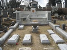 an old cemetery with many headstones and graves