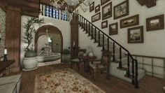 a living room filled with lots of furniture and pictures on the wall next to a stair case