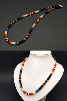 Adorn yourself with the elegance of this seed bead ethnic necklace, inspired by Native American traditions. The ethnic choker design and intricate beadwork make it a stylish and symbolic piece. Hand-strung Round Beads Choker For Festival, Hand-strung Choker With Round Beads For Festival, Festival Choker With Hand-strung Round Beads, Spiritual Colorful Beads Choker Necklace, Handmade Southwestern Black Beaded Necklace, Southwestern Style Black Beaded Necklaces As Gift, Southwestern Black Beaded Necklaces For Gifts, Southwestern Style Black Beaded Necklaces For Gifts, Southwestern Black Beaded Necklace Gift