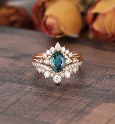 "MADE TO ORDER * Material: Solid gold(14K/18K white/yellow/rose gold) * DETAILS 58698/57443/57447 Engagement ring -center stone: Teal sapphire 5*7mm oval cut - width: approximately 1.5mm  - thickness: approximately 1.3mm Side stone: Moissanite or Diamond - diamond:0.16ct,2*3mm pear cut, Color G-H, Clarity SI-VS - moissanite:0.16ct Wedding Band 1 Stone:Moissanite or diamond - diamond:2*3mm Pear cut,Color G-H,Clarity SI-VS - moissanite:2*3mm Pear cut Wedding band Stone:Moissanite or diamond - diamond:3mm round cut0.42ct,Color G-H,Clarity SI-VS - moissanite:0.42ct * Click on the \"Pin It\" icon if you like this item * Custom Order We can make custom rings in almost any shape and style. If you want a specific model, please send us a clear picture and we will do our best.  * Shipping Most items Oval Emerald Stackable Rings, Blue Oval Stackable Wedding Rings, Blue Oval Stackable Rings For Wedding, Antique Crown, Blue Green Sapphire Ring, Teal Sapphire Engagement Ring, Art Deco Sapphire Ring, Sapphire Engagement Ring Set, Green Sapphire Ring