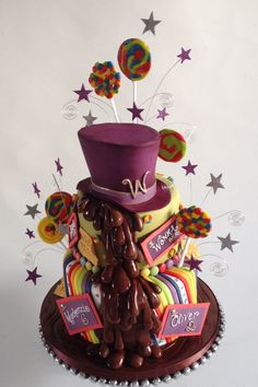 a cake decorated with candy and candies on a plate