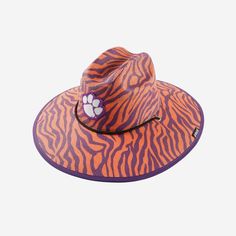 Camping trips. Beach days. Gamedays. Keep the sun out of your eyes and your team spirit on your head with the Clemson Tigers Thematic Straw Hat. Features All-over team-colored design so you can rep the team in style Thematic, team-specific pattern that will look great with the rest of your team apparel Sturdy straw construction that makes this a fit for your summer style Embroidered team logo display, in case there were any doubts where your allegiances lie Black lace chin string for a comfortab Adjustable Collegiate Hats For Outdoor, Tiger Shirt, Logo Display, Clemson Tigers, Team Apparel, Beach Days, Face Cover, Unisex Style, Camping Trips