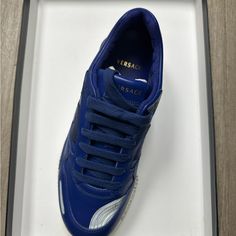 Brand New Versace Athletic Sneakers Blue Sneakers With Studded Rubber Outsoles, Luxury Navy Sneakers With Round Toe, Luxury Blue Sneakers With Contrast Sole, Luxury Blue Sneakers With Rubber Sole, Blue Sporty Custom Sneakers With Studded Outsoles, Blue Low-top Custom Sneakers With Studded Outsoles, Designer Blue Low-top Sneakers, Designer Blue Lace-up Sneakers, Designer Blue Low-top Custom Sneakers