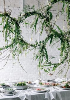 the instagram page for instagram is filled with food and greenery hanging from branches