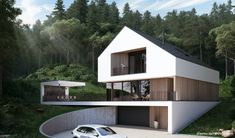 a white car is parked in front of a house with wooden siding and balconies