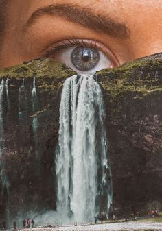 an eye looking at a waterfall with people standing around it