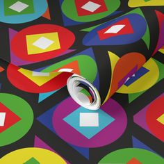 an abstract wallpaper with multicolored circles and shapes on black background, featuring a white roll of tape