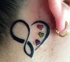 a person with a tattoo on their neck has a heart and an infinite sign behind the ear