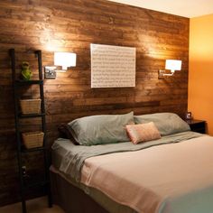 a bedroom with wood paneling on the wall