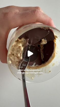 a hand holding a spoon with food in it and the words, what is chocolate?