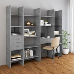 a room with a chair, bookshelf and shelves