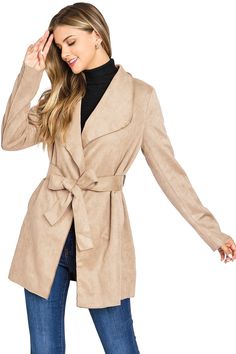 Faux-suede wrap coat with a mid thigh length, trench coat silhouette. Minimal, classic design with oversized draping lapels, slant pockets on the sides and a self-tie belt at the waist. Light weight coat effortlessly layers without looking bulking. CARE | Hand Wash Cold CONTENTS | Shell: 96% Polyester/ 4% Spandex/ Lining: 100% Polyester MEASUREMENTS | 33"/84 cm Top to Bottom MODEL | 5'8 - wearing a size S/M IMPORTED Belted Long Pea Coat For Fall, Fall Outerwear With Belt And Notch Lapel, Fall Outerwear With Belted Notch Lapel, Fall Notch Lapel Belted Outerwear, Fall Belted Pea Coat With Notch Lapel, Belted Outerwear With Notch Lapel For Fall, Spring Outerwear With Tie Waist In Solid Color, Fall Notch Lapel Belted Pea Coat, Spring Outerwear With Tie Waist