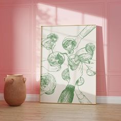 a vase sitting in front of a pink wall with a painting on it's side