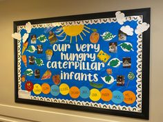 a bulletin board with the words our very hungry caterpillar infants