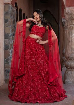 Item: Lehenga Set ( Lehenga Skirt, Blouse and Dupatta) Illuminate your wedding day with our Crimson Bridal Lehenga, a radiant blend of tradition and contemporary elegance. Handcrafted with love and care by our artisans, this ensemble is designed to make you feel like the most beautiful bride in the world. Customize your lehenga and let your inner radiance shine as you create timeless memories on your special day. The stunning bridal attire made on premium quality net fabric has cutdana and pearl embellishments with tone to tone embroidery done making this a designer lehenga for your big day. Our bespoke lehengas are designed with a can-can lining beneath the skirt to ensure a voluminous silhouette that enhances your twirls and captures stunning photographs. At Vivah by Shobitam, our utmost Lengha Blouse Designs, Lehenga Choli Designs, Special Occasion Gowns, Red Mermaid, Bridal Attire, Skirt Blouse, Lehenga Skirt, Designer Lehenga Choli, Net Fabric