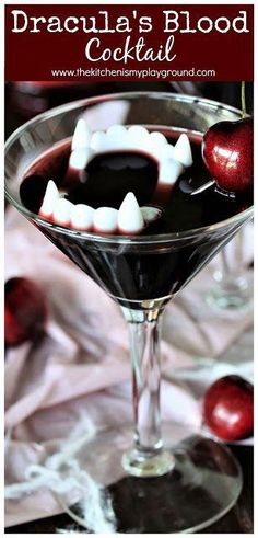 an apple and marshmallow drink in a martini glass with the words dracula's blood cocktail