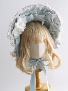 Elevate your Lolita ensemble with this enchanting Light Blue Floral Design Bowknots Bonnet. Adorned with delicate lace trim, this bonnet features a charming floral that adds a touch of elegance and whimsy to any outfit. The intricate bowknots enhance its sweet and sophisticated appeal, making it a perfect accessory for both casual and formal Lolita looks. Straw Bonnet, Lace Hairband, Blue Floral Design, Cottagecore Outfits, Black Layers, Floral Accessories, Blue Bonnets, Big Bows, Reference Photos