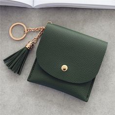 Brand Name: PURDOREDMain Material: PUOrigin: CN(Origin)Gender: WOMENMaterial Composition: PU leatherPattern Type: SolidStyle: FashionClosure Type: zipperUse: Credit CardModel Number: B70205Item Length: 10cmItem Type: Card ID HoldersItem Weight: 70gItem Width: 10cmShape: Boxitem name: mini card holdermaterial: pucolor: 4 colorssize: 10*10 cmpackage: 1 pcdropshipping: yes Key Bag, Mini Pouches, Short Wallet, Tassel Bag, Wallet Fashion, Coin Pouch, Leather Tassel, Leather Items, Leather Mini