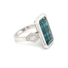 For Sale on 1stDibs - This baguette indicolite tourmaline has bezel setting in white gold. East west has accent diamond. Carefully crafted with skilled artisan this ring design Luxury Tourmaline Emerald Ring, Luxury Emerald Baguette Cut Bezel Set Ring, Luxury Rectangular Emerald Ring, Luxury Emerald Ring With Rectangular Stone, Luxury Silver Emerald Rectangular Ring, Luxury Silver Rectangular Emerald Ring, Luxury Rectangular Emerald Ring In White Gold, Indicolite Tourmaline, Gold Cocktail Ring