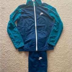 Classic Polyester Tracksuit For Girls In A Size Large ~ Nwt Casual Blue Winter Sets, Blue Casual Sets For Fall, Casual Blue Tracksuit With Pockets, Fitted Blue Tracksuit For Sportswear, Blue Tracksuit With Pockets And Long Sleeves, Blue Fitted Long Sleeve Tracksuit, Blue Spring Tracksuit Sportswear, Blue Winter Tracksuit Sportswear, Blue Sporty Tracksuit With Pockets