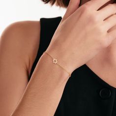 "1- P R O D U C T ∙  D E S C R I P T I O N This 14K Solid Gold Dainty Star of David Bracelet is a true symbol of faith and fashion. The gourmet chain design, coupled with the delicate star emblem, makes it an ideal piece for daily wear or for special Jewish celebrations. This bracelet is not just a piece of jewelry, it's a timeless keepsake. Perfect as a gift for her, this bracelet is a beautiful way to express love, faith, and devotion. 2- P R O D U C T ∙  D E T A I L S Gold material: 14K solid Elegant 14k Gold Star Of David Jewelry, Elegant Star Of David Jewelry For Formal Occasions, White Gold Star Of David Jewelry, Bracelet Stands, Jewish Celebrations, Jewish Star, Solid Gold Chains, Chain Design, Star Bracelet