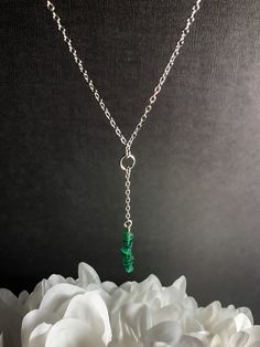 Your new Elegant green Aventurine necklace doubles as a crystal choker of the Sacred Feminine in representation. Wear this delicate Y Lariat design as a Calming Protection talisman due to it's Aventurine crystal gemstone pendant 💚 Aventurine embodies the energies of prosperity and abundance 💚 Aventurine has a calming influence 💚 Aventurine is said to be a healing crystal in that it is known as an anti-inflammatory, and for stimulating metabolism. - 3-6mm Natural Aventurine - 3mm Sterling Silv Green Jade Jewelry With Adjustable Chain, Green Jade Pendant Crystal Necklace, Green Dangle Spiritual Jewelry, Spiritual Green Jewelry With Adjustable Chain, Spiritual Green Dangle Jewelry, Green Crystal Necklaces For May Birthstone, Green Lariat Jewelry With Adjustable Chain, Minimalist Green Necklaces With Natural Stones, Green Necklace For Meditation - May Birthstone