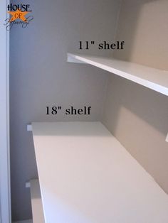 an empty closet with shelving measurements for each shelf