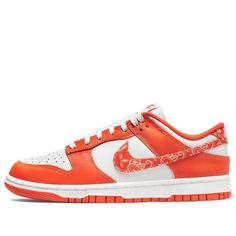 The Nike Dunk Low 'Orange Paisley' is a stylish and iconic sneaker for women. It features a white leather base with an orange upper, brand tongue, insole, and rubber sole. The Swoosh and heel are accented with a paisley bandana print, while the tongue, heel, insole, and midsole remain white. This sneaker is perfect for everyday wear, whether you're running errands or going out with friends. The inspiration for this design comes from the classic Dunk series, which has been a staple in Nike's line 720 Nike, Dunk Shoes, Air Max Excee, Nike Air Max Excee, Jordan 8, Sb Dunk